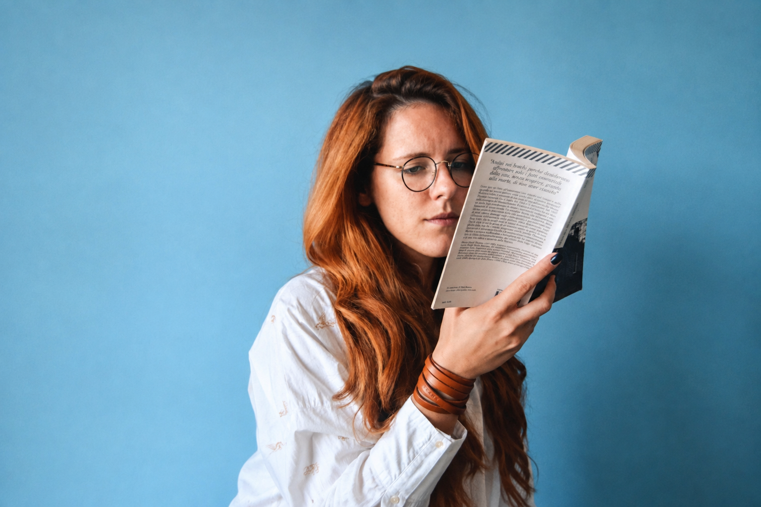 Woman deeply engaged in a book