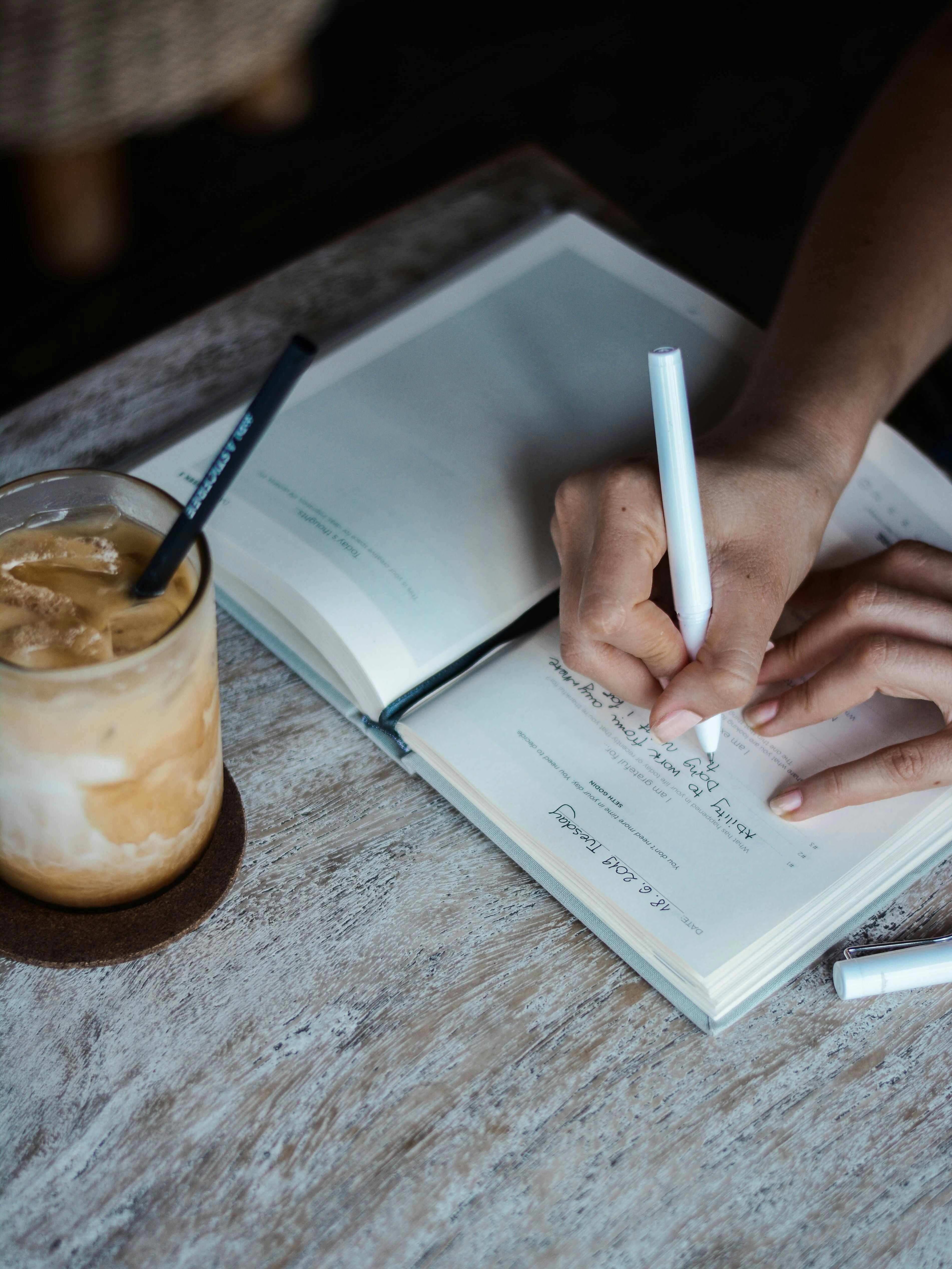 Person journaling with intention
