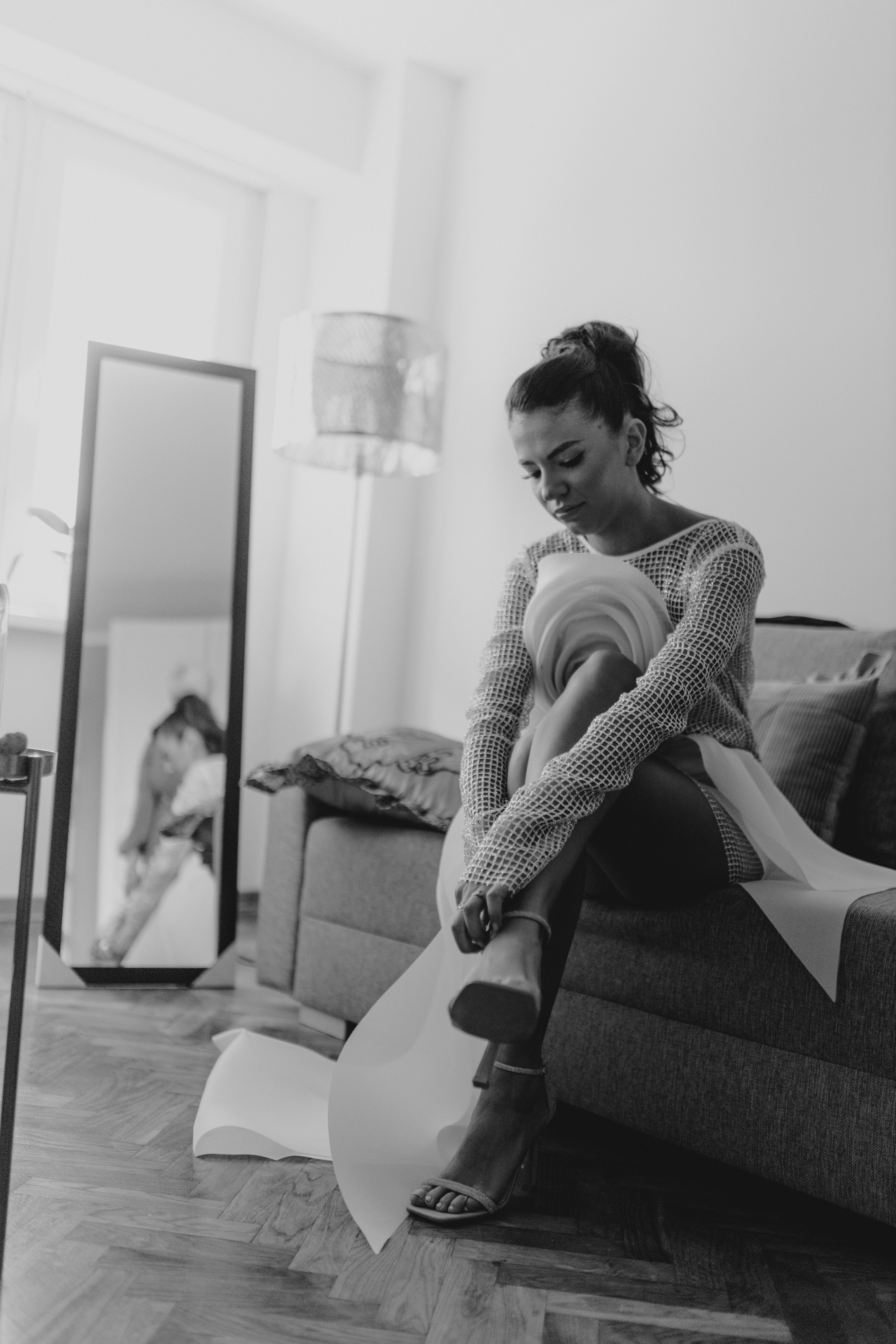 Woman sitting alone looking inward and reflective