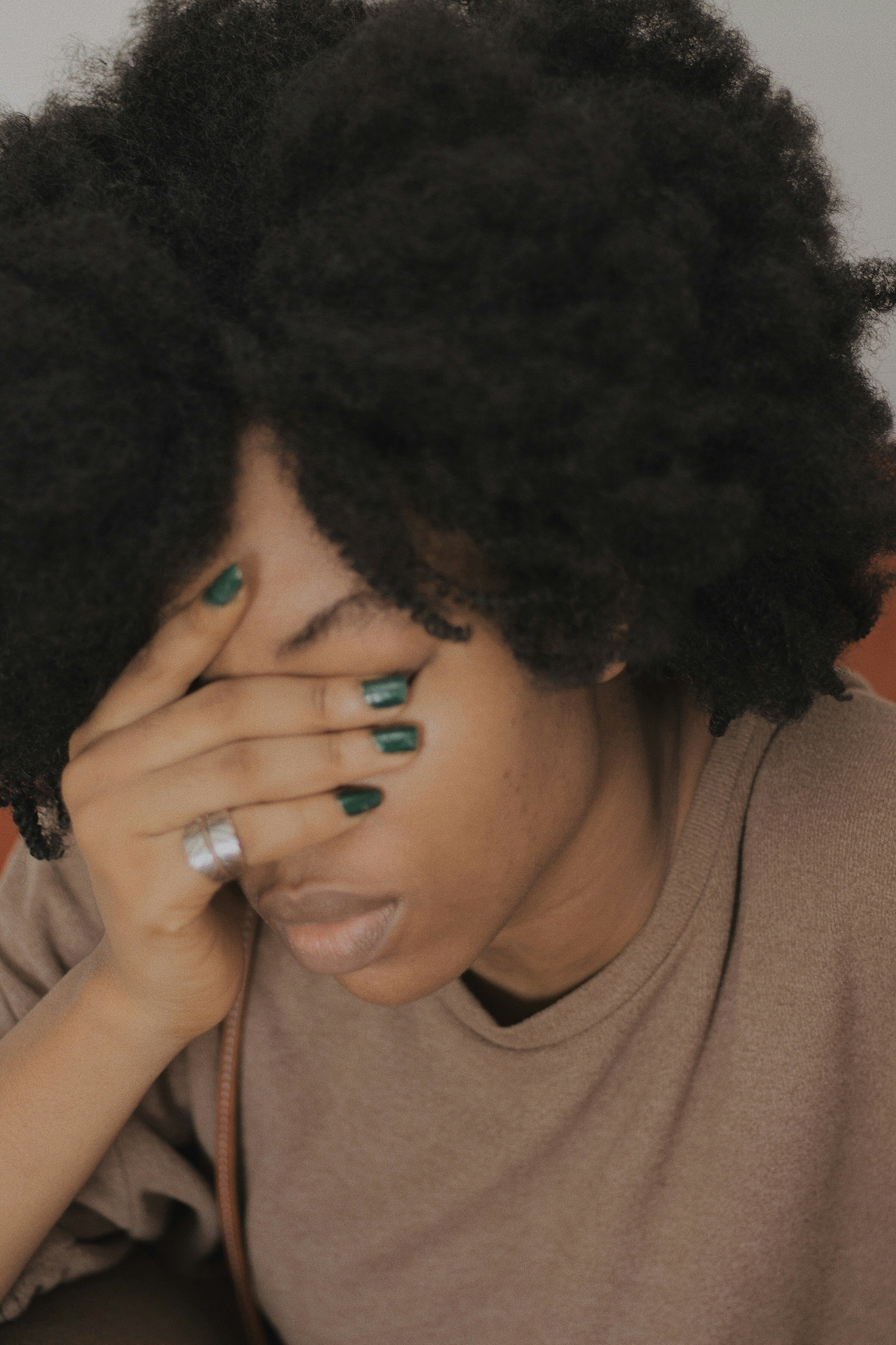 Woman overwhelmed and emotionally exhausted
